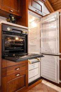 Kuchyň nebo kuchyňský kout v ubytování Casa Quarto di Luna