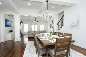 a dining room with a table and chairs at Houston Home Near Downtown with Pool and Hot Tub! in Houston