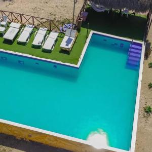 View ng pool sa Estadía en hermoso hotel en la isla de punta arena cartagena o sa malapit