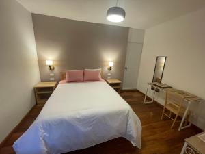 Postel nebo postele na pokoji v ubytování Illa B&B