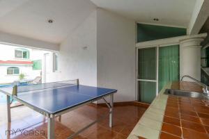Pingisbord vid eller i närheten av Hermosa casa con alberca/jacuzzi - C14
