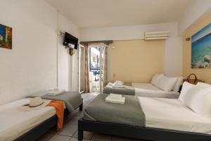 Posteľ alebo postele v izbe v ubytovaní Agrabella Hotel - Adults Only
