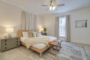 a bedroom with a bed and a ceiling fan at Cozy Virginia Home in Lynchburg Historic District! in Lynchburg