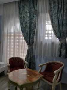 Letto o letti in una camera di Hotel Lula