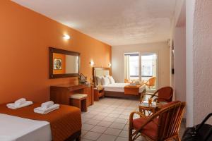 Posteľ alebo postele v izbe v ubytovaní Agrabella Hotel - Adults Only