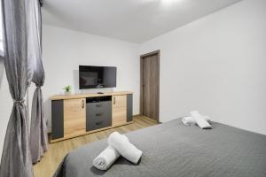 Posteľ alebo postele v izbe v ubytovaní Milan&Eva