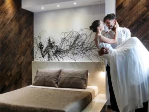 A bed or beds in a room at Privée Santorini