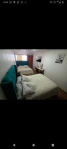 Ein Bett oder Betten in einem Zimmer der Unterkunft Hostal restaurante Hidalgo