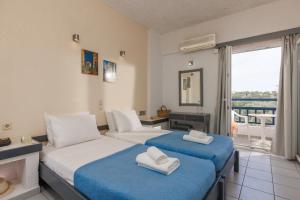 Posteľ alebo postele v izbe v ubytovaní Agrabella Hotel - Adults Only