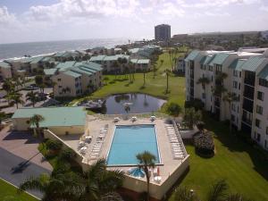 an aerial view of a resort with a swimming pool at Ocean Village in Fort Pierce