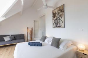 Postel nebo postele na pokoji v ubytování Baie Nettle Beach Villa 1130 + 25 fotografií