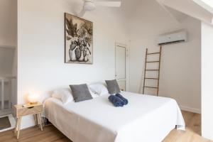 Postel nebo postele na pokoji v ubytování Baie Nettle Beach Villa 1130