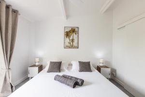Postel nebo postele na pokoji v ubytování Baie Nettle Beach Villa 1130