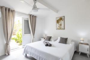 Postel nebo postele na pokoji v ubytování Baie Nettle Beach Villa 1130