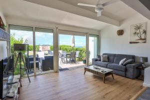Posezení v ubytování Baie Nettle Beach Villa 1130