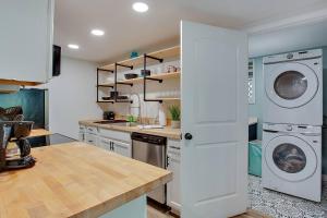 a kitchen with a washer and dryer in it at Retreat for 2 @ Lake Talquin in Tallahassee