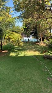 Jardín al aire libre en Maravilhoso chalé num paraíso em Japaratinga