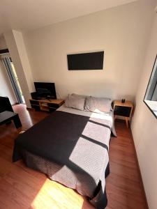 Кровать или кровати в номере Apartamento en Las Cañitas