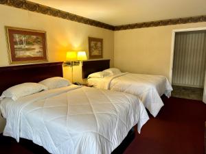 En eller flere senge i et værelse på The Stratton Inn