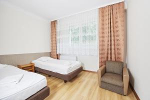 Posteľ alebo postele v izbe v ubytovaní Ośrodek Wczasowy PANORAMA Szczyrk