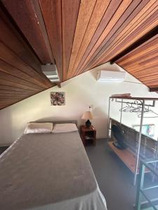 Кровать или кровати в номере By Búzios Loft