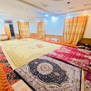 Ένα ή περισσότερα κρεβάτια σε δωμάτιο στο Finger Peak Hotel