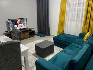 Μια τηλεόραση ή/και κέντρο ψυχαγωγίας στο Serene cozy homes Kericho