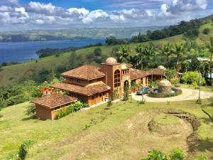 an aerial view of a house on a hill at Lake Arenal Killer View Villa in Tilarán