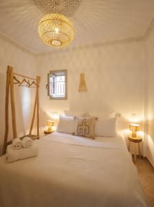 Postel nebo postele na pokoji v ubytování Riad 17-M - Marrakech