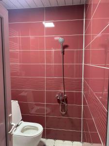 Koupelna v ubytování Racha Rooms + 12 fotografií