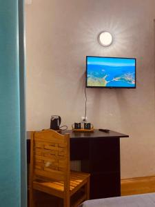 TV a/nebo společenská místnost v ubytování Racha Rooms