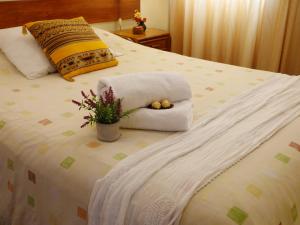 Postel nebo postele na pokoji v ubytování Suite Service Apart Hotel