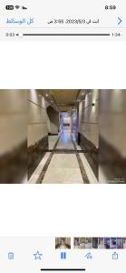 uma imagem de um túnel com uma imagem de um corredor em Osama Fwaz no Cairo