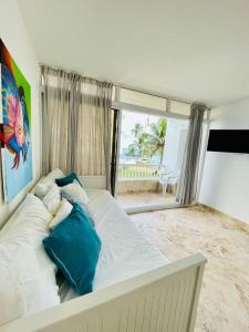 Postel nebo postele na pokoji v ubytování Apartamento piscina jardines en playa Juan Dolio