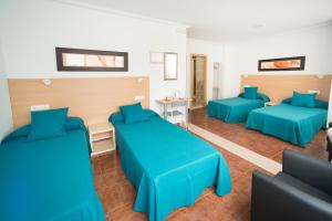 Posezení v ubytování Hostal Mitre Paterna