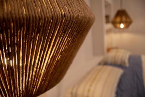 a close up of a vase in a room at Palacio Huatulco - 5F in Santa Maria Huatulco +10 photos