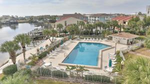 an overhead view of a swimming pool in a resort at Dolphin Point 404B - 2BR on Holiday with Views of Harbor in Destin