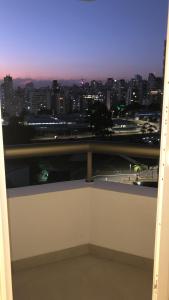 a view of a city skyline from a balcony at Royal Ibirapuera Park in Sao Paulo