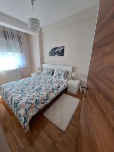 Llit o llits en una habitació de Apartman Bedem