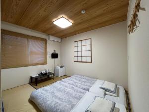 Postel nebo postele na pokoji v ubytování Karin doo Hotel