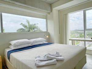 Ένα ή περισσότερα κρεβάτια σε δωμάτιο στο Ribalta Hotel Barra da Tijuca by Atlantica