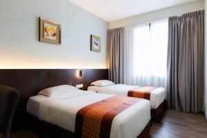 Voodi või voodid majutusasutuse 56 Hotel toas