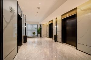 Fotografie z fotogalerie ubytování Rezen Select Hotel guagnzhou Baiyun International Airport T2 Canton Fair Certificate Application & Free Shuttle v destinaci Huadu