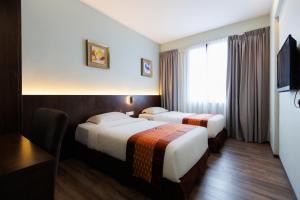 Voodi või voodid majutusasutuse 56 Hotel toas