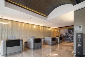 TV o dispositivi per l'intrattenimento presso Rezen Select Hotel guagnzhou Baiyun International Airport T2 Canton Fair Certificate Application & Free Shuttle