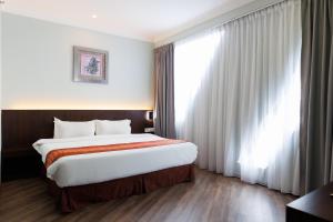 Voodi või voodid majutusasutuse 56 Hotel toas
