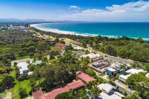 an aerial view of a city and the ocean at A Perfect Stay - Cooinda in Byron Bay