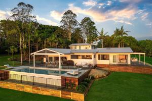 a house with a swimming pool in the yard at Miren Estate - lavish hinterland estate with pool in Federal