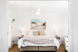 מיטה או מיטות בחדר ב-A Perfect Stay - Boulders Retreat