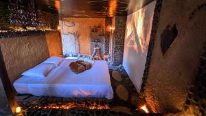 Letto o letti in una camera di BioHotel Ecohouse
